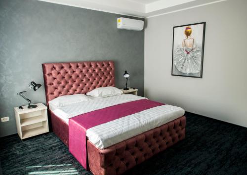 Postel nebo postele na pokoji v ubytování ZEN Hotel Focșani
