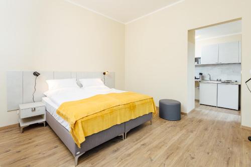 Postel nebo postele na pokoji v ubytování Apartmánový dom GRAND - Contactless Check In