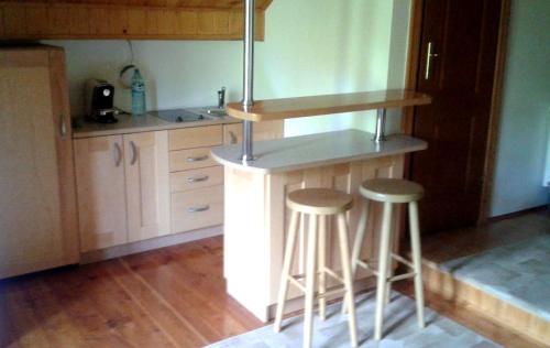 Η κουζίνα ή μικρή κουζίνα στο Apartamenty Pod Gruszką
