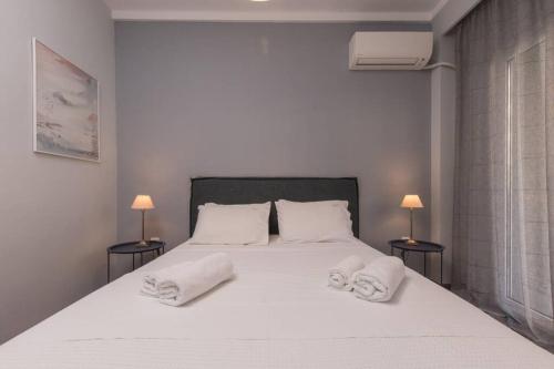 Posteľ alebo postele v izbe v ubytovaní Feel like Home in Thessaloniki