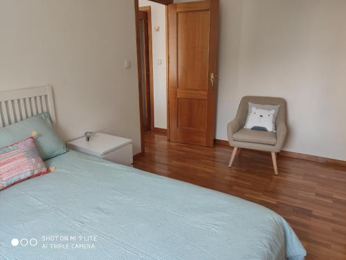 Posteľ alebo postele v izbe v ubytovaní Luminoso y acogedor apartamento en la playa