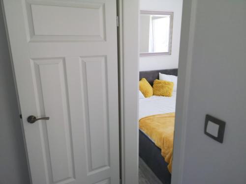 Ένα ή περισσότερα κρεβάτια σε δωμάτιο στο Apartament AMMA - De Luxe - Free Parking