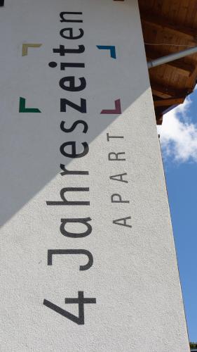 a close up of a sign on the side of a building at 4 Jahreszeiten in Fiss