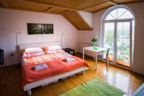Postel nebo postele na pokoji v ubytování Rooms Ambrožič
