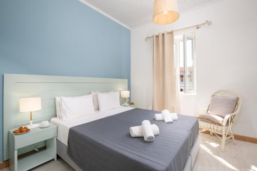 Ένα ή περισσότερα κρεβάτια σε δωμάτιο στο Patriko Beach House