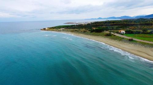 an aerial view of a beach and the ocean at Villa Orsola in Villaputzu