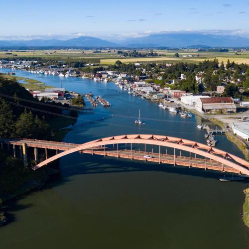 an aerial view of a bridge over a river at La Conner Channel Lodge in La Conner