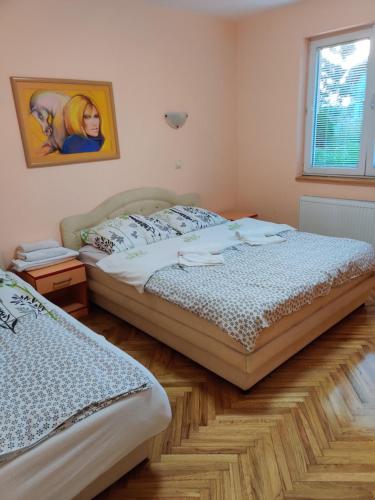 Postel nebo postele na pokoji v ubytování Villa Dama & Dubravka