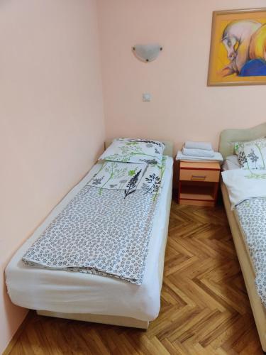 Postel nebo postele na pokoji v ubytování Villa Dama & Dubravka