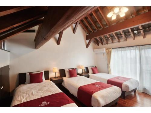 Un pat sau paturi într-o cameră la Kunigami-gun - Hotel - Vacation STAY 89680