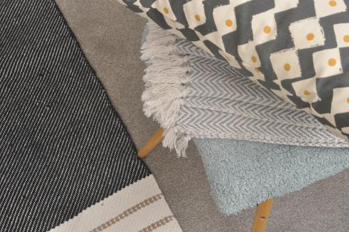 two umbrellas sitting on the floor next to each other at Bridge Street Apartments. Boutique Style Luxury, in the heart of Taunton. in Taunton
