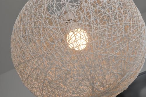 a large metal ball hanging from a ceiling at Bridge Street Apartments. Boutique Style Luxury, in the heart of Taunton. in Taunton