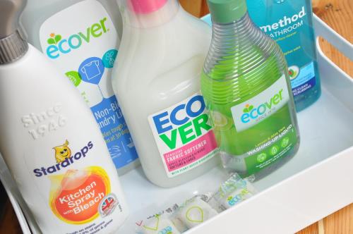 a shelf with bottles of milk and other cleaning products at Bridge Street Apartments. Boutique Style Luxury, in the heart of Taunton. in Taunton