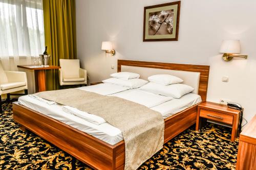 Posteľ alebo postele v izbe v ubytovaní Simbad Hotel & Bar Superior