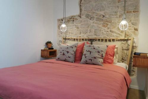 Ένα ή περισσότερα κρεβάτια σε δωμάτιο στο Casa Porta Verde