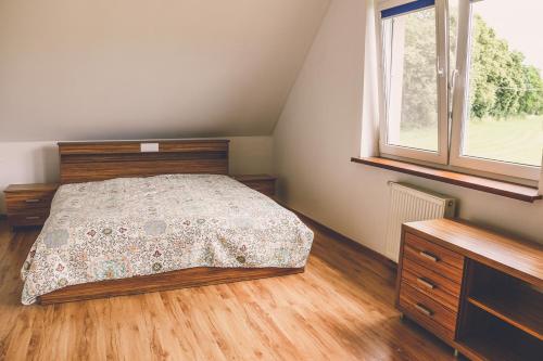 Postel nebo postele na pokoji v ubytování IKA