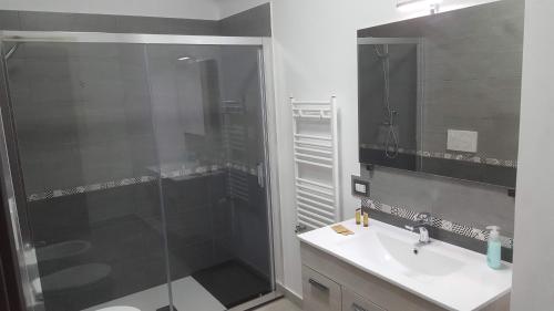 Koupelna v ubytování Idilliaco inn