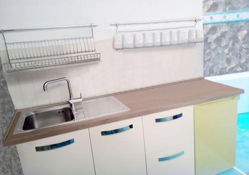 a kitchen with a sink and a counter top at Monterosso al Mare 20 in Monterosso al Mare