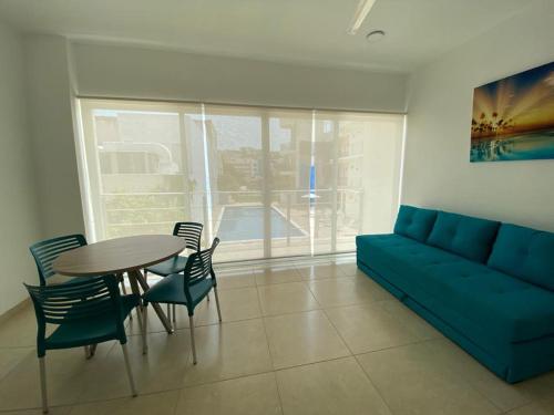 Ein Sitzbereich in der Unterkunft Hotel Huatulco Máxico
