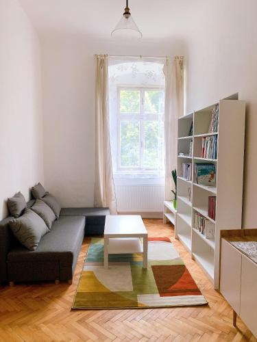 a living room with a couch and a table at Zámek Ruda nad Moravou in Ruda na Moravě