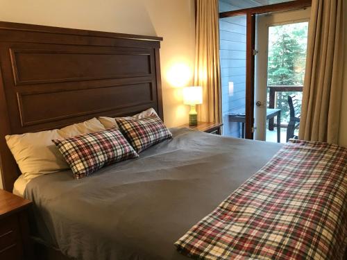 Ένα ή περισσότερα κρεβάτια σε δωμάτιο στο Luxurious & Spacious Mountain Retreat