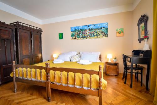 A bed or beds in a room at Villa Holiday Home Kuća za odmor Slavonka