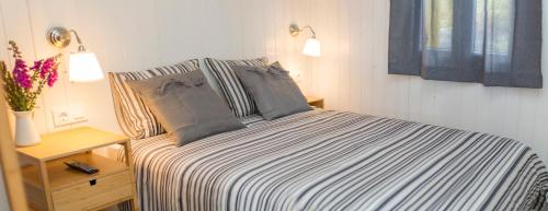 Posteľ alebo postele v izbe v ubytovaní Cabanas de Vendaval