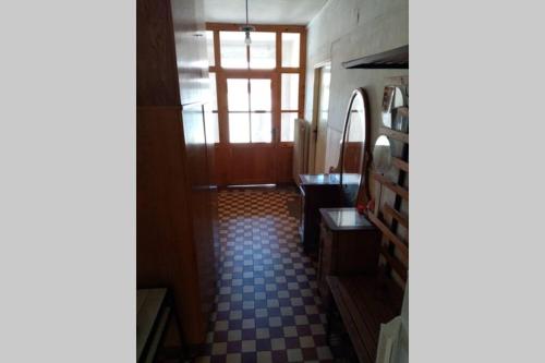 a bathroom with a toilet and a sink and a mirror at Statek in Veverská Bítýška