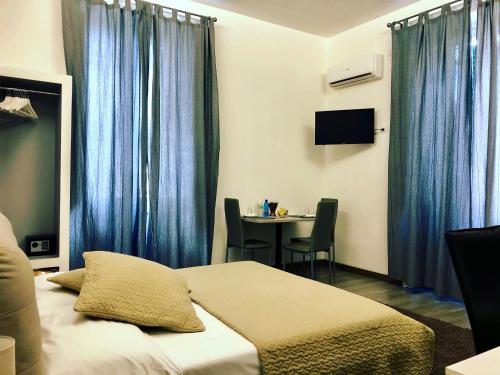 Ένα ή περισσότερα κρεβάτια σε δωμάτιο στο Deluxe B&B Centrocitta
