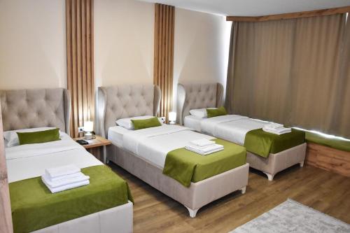 Postel nebo postele na pokoji v ubytování Motel KVELE