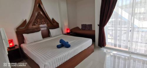 Кровать или кровати в номере Sure Guesthouse