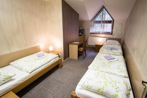 Hotel Šomkaにあるベッド