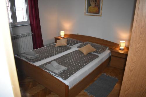 Katil atau katil-katil dalam bilik di Holiday Home - Marija