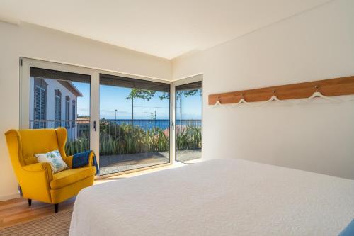 Llit o llits en una habitació de Casa da Cal - by Casas na Ilha