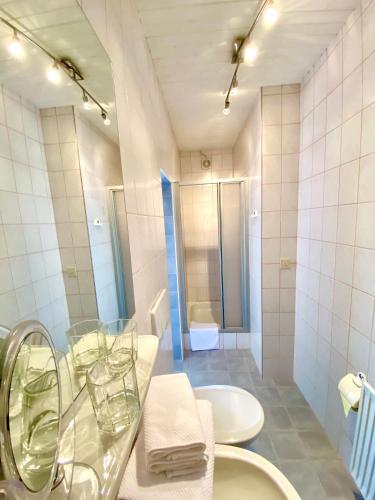 a bathroom with a sink and a mirror at Pleschinhof in Velden am Wörthersee