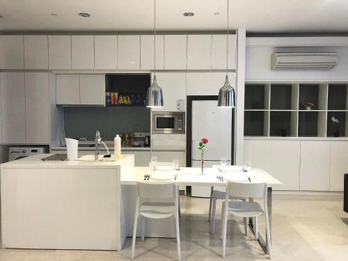 A kitchen or kitchenette at Staycation in KL City- Platinum Suites