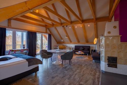 Postel nebo postele na pokoji v ubytování Arthotel ANA Style Augsburg