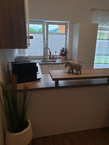 a figurine of a bear on a counter in a kitchen at Apartment Hofacker in Pernegg an der Mur