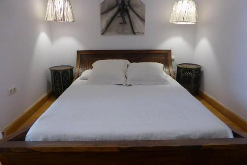Un pat sau paturi într-o cameră la Las Terrazas