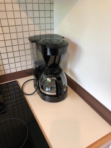 a coffee maker sitting on top of a counter at Seeblick in Fockbek
