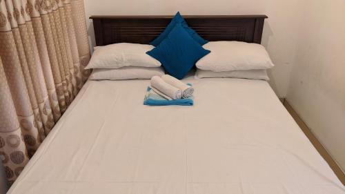 Postel nebo postele na pokoji v ubytování Cottage Home Belihuloya