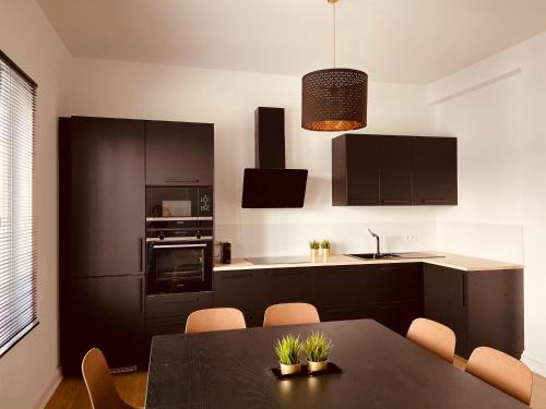 A kitchen or kitchenette at Avenue Rops