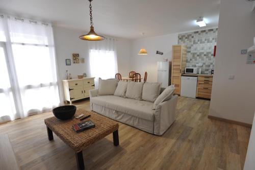 a living room with a couch and a table at Lagos Central Apartments Ap 1 in Lagos