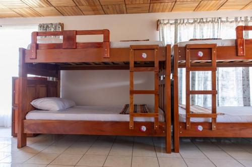 Postel nebo postele na pokoji v ubytování Hostel Bouganvilia Bed and Breakfast