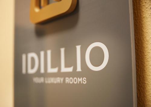 a close up of the bilida logo on a door at IDILLIO YOUR LUXURY ROOMS in Pescara