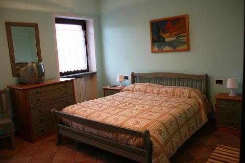 Giường trong phòng chung tại Residence La Bellotta