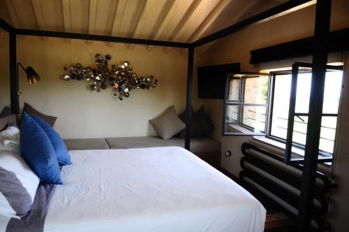 Krevet ili kreveti u jedinici u okviru objekta Olive Luxury Chianti House