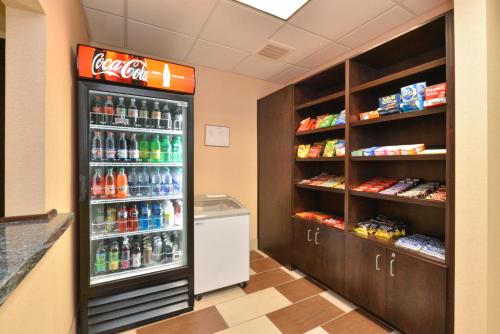a cocacola soda refrigerator in a store at Holiday Inn Express Columbia by IHG in Columbia