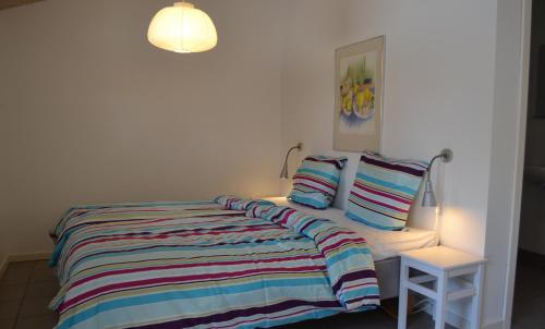En eller flere senge i et værelse på Bed & Breakfast Tistrup