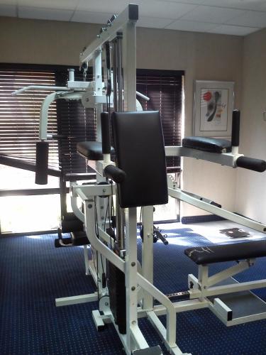 a room with a gym with a tread machine at Wyndham Garden Monterrey Norte in Monterrey